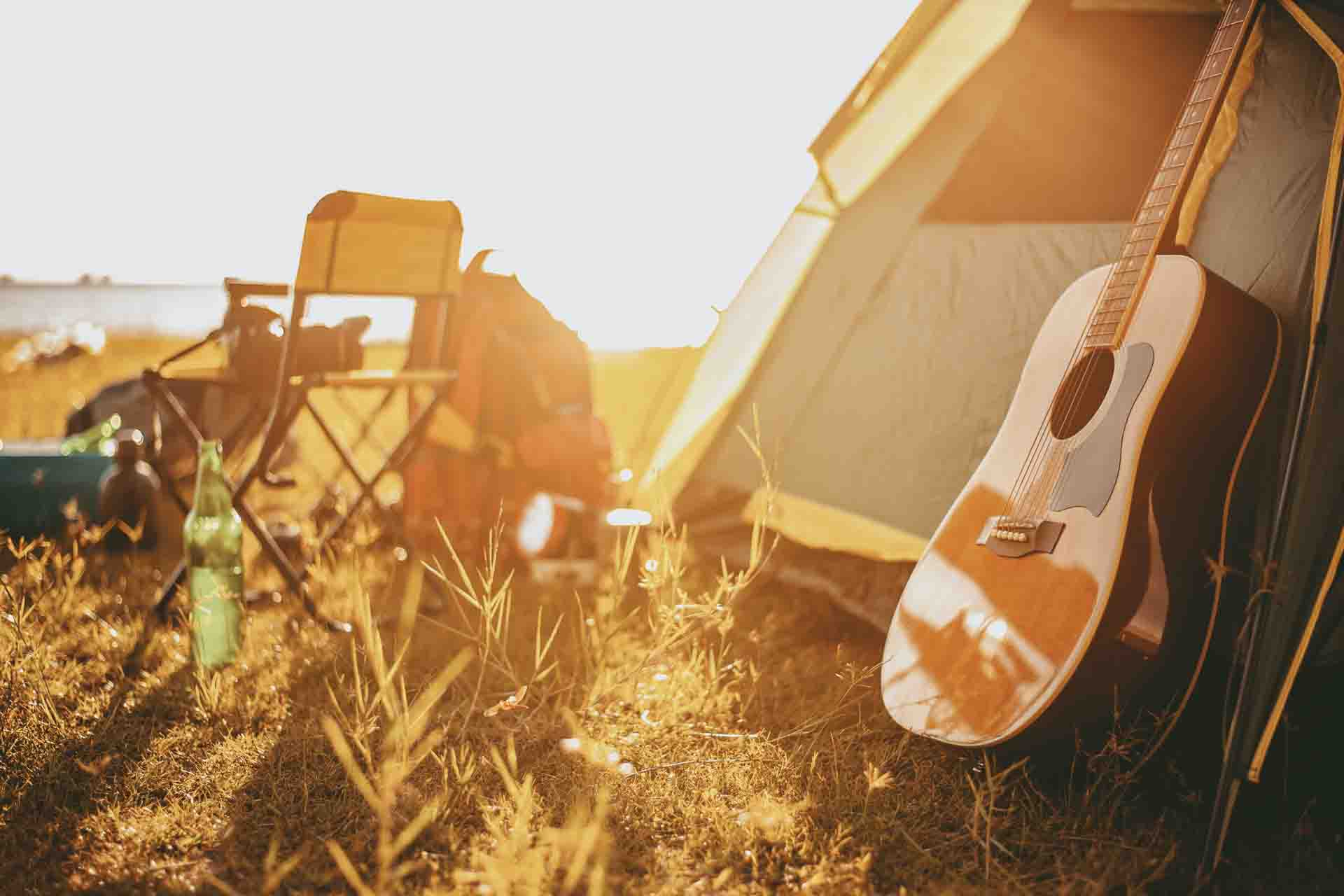 the-guitar-focus-is-on-the-side-of-the-tent-of-the-2022-12-03-03-22-37-utc